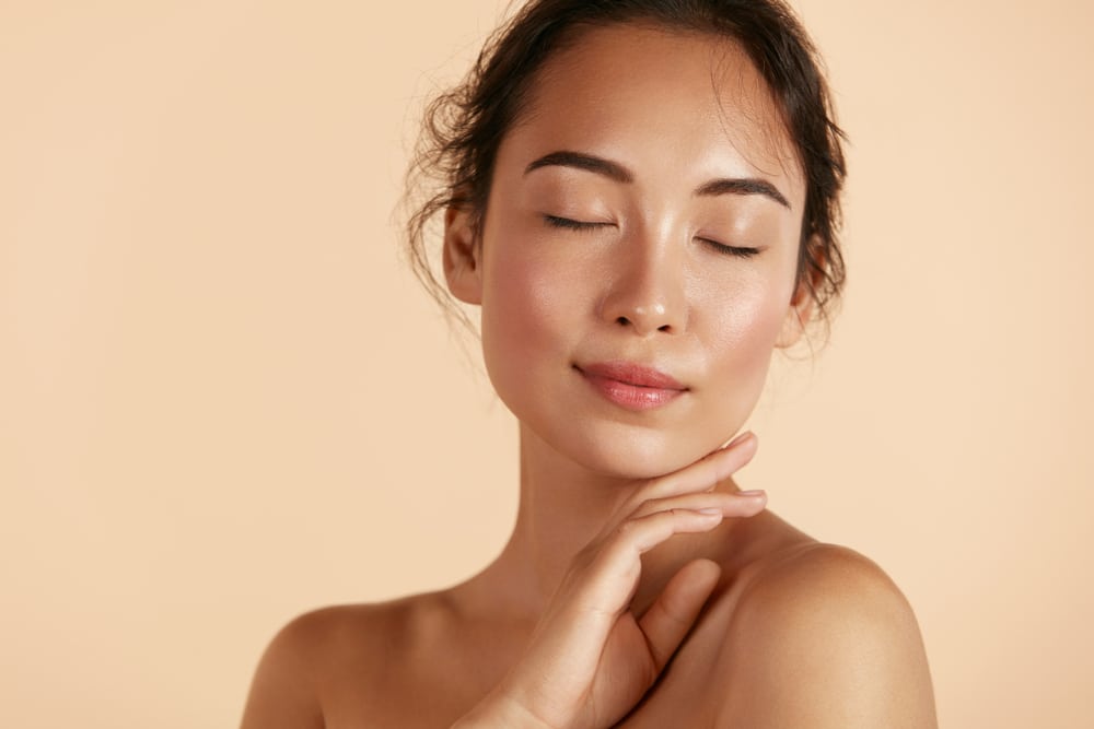 Beautiful woman with glowing skin after IPL photofacial laser treatment