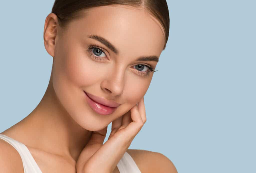 Woman with glowing, healthy skin after HydraFacial treatment in Sugar Land, TX