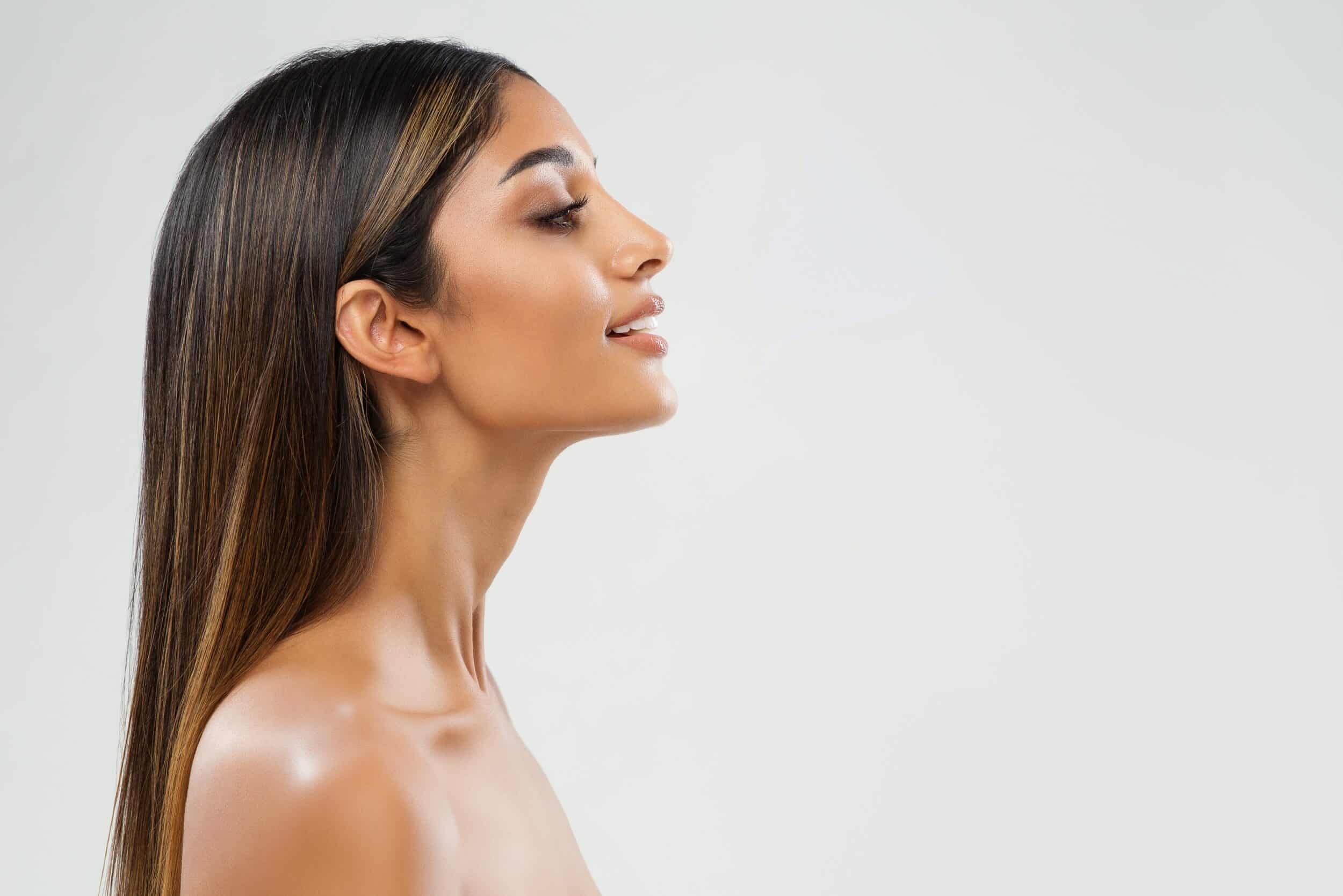 Woman with glowing, youthful skin after chemical peel treatment in Sugar Land, TX