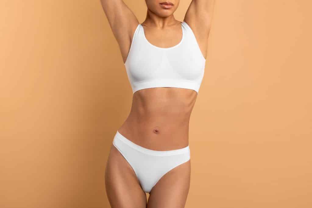 Woman after abdomen tightening in Sugar Land, TX