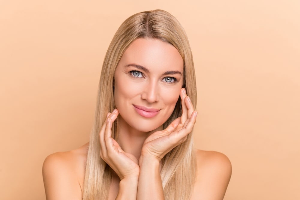 Woman with acne-free skin after treatment in Sugar Land, TX
