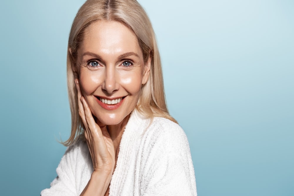 Woman with glowing skin after hydrafacial in Sugar Land, TX